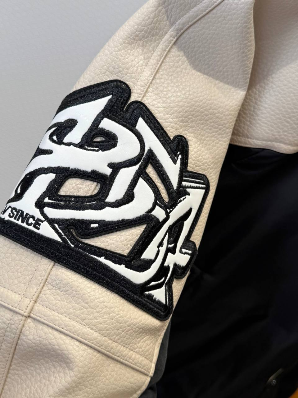 LV Leather And Nylon Embossed Varsity Jacket